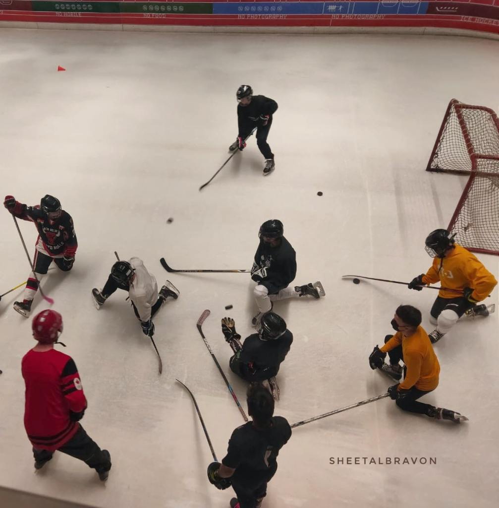 Players ready to play ice hockey on an ice rink. 